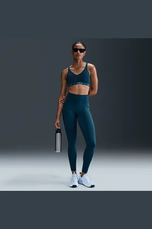 Nike Legging taille haute à maintien normal et coupe longue avec poches Universa pour femme