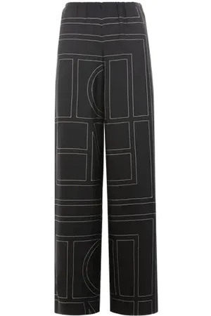 Totême Pantalon à motifs