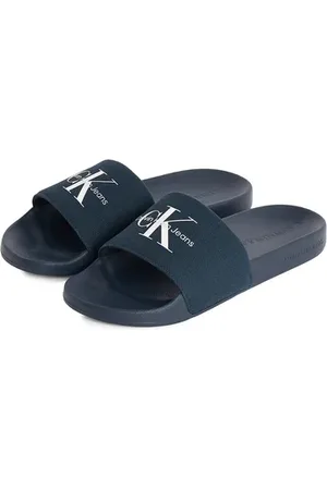 Calvin Klein Claquettes à logo