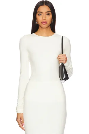 ÉTERNE Long Sleeve Fitted Top in .