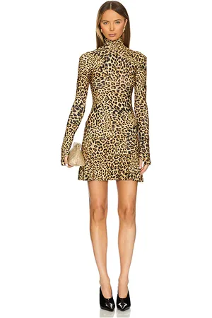 Norma Kamali Long Sleeve Turtleneck Fishtail Mini Dress in .