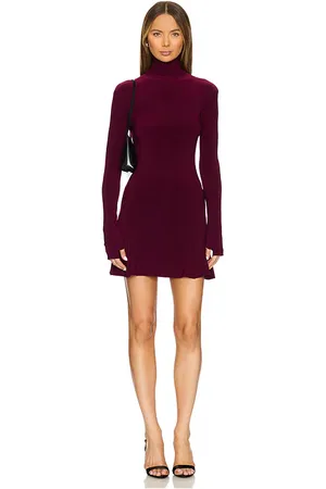 Norma Kamali X REVOLVE Long Sleeve Turtleneck Fishtail Mini Dress in .