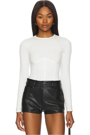 FLEUR DU MAL Organic Cotton Long Sleeve T-shirt Bodysuit in .