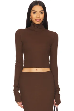 ÉTERNE Cropped Fitted Turtleneck Top in .