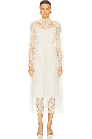 SEA Lumi Eyelet Peplum Long Sleeve Dress in .