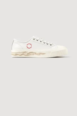 Sandro Baskets en cuir à semelle flamme
