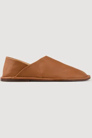 Sandro Slippers en cuir grainé