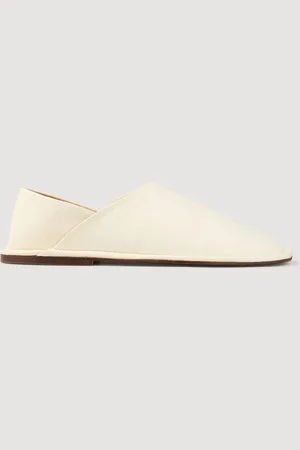Sandro Slippers en cuir grainé