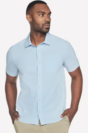 Skechers The GO WALK Air short Sleeve Shirt en Bleu Clair/Argent