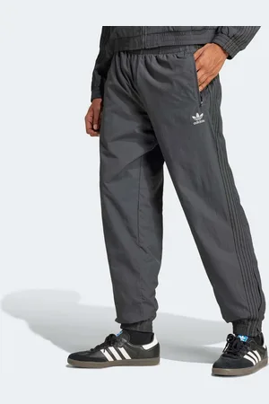 adidas Pantalon de Survêtement Tissé Firebird Homme Pantalons survêtements Taille S Vêtements