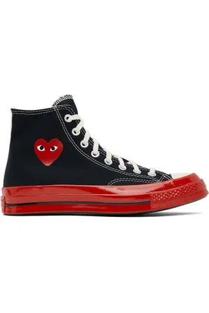 Converse noir et discount rouge