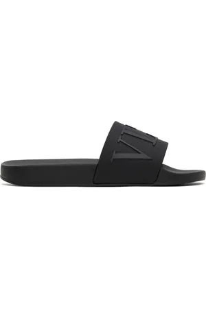 VALENTINO GARAVANI Sandales à enfiler noires à logo VLTN