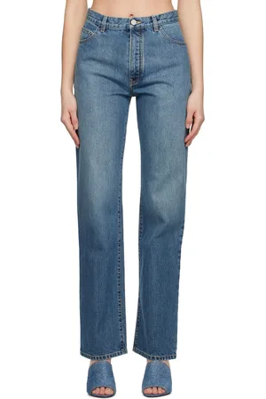 Alaïa Jean bleu à effet délavé