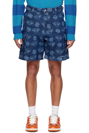 Billionaire Boys Club Short bleu en denim à motif graphique imprimé