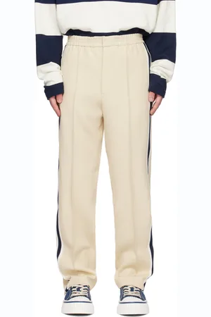 Ami Pantalon beige à rayures