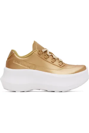 Comme des Garçons Baskets SR811 dorées édition Salomon