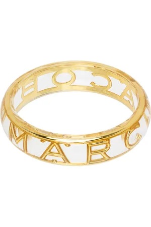 Marc Jacobs Bracelet manchette transparent et doré à monogrammes