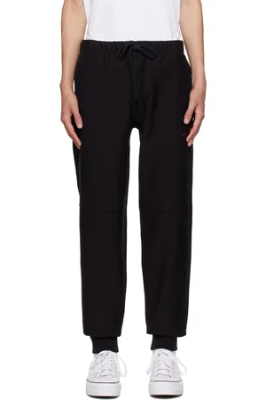 Carhartt Pantalon de survêtement noir à logo brodé