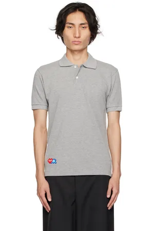 Comme des Garçons Polo gris édition Invader
