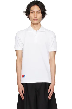 Comme des Garçons Polo blanc édition Invader