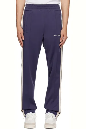 Palm Angels Pantalon de survêtement bleu à rayures
