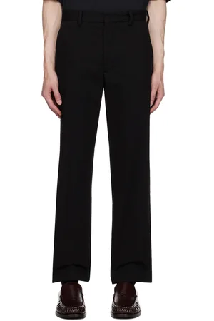 Acne Studios Pantalon noir à étiquette à logo