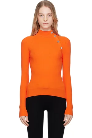 Moschino Col roulé orange en tricot côtelé