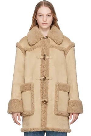 Moschino Manteau beige en suède synthétique à fermoirs à traverse