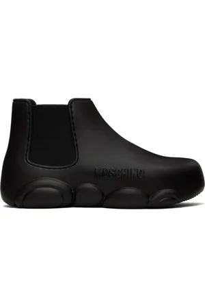Moschino Bottines noires en caoutchouc
