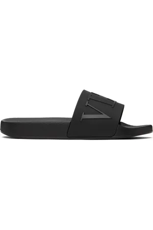 VALENTINO GARAVANI Sandales à enfiler noires à logo VLTN