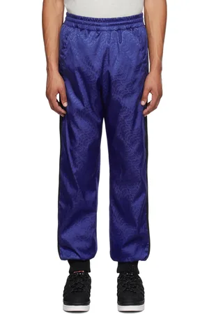 Moncler Pantalon bleu rembourré en duvet - Moncler x adidas Originals