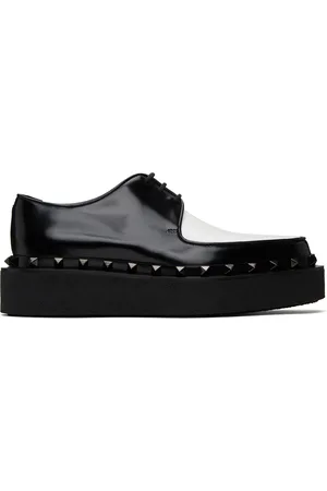 VALENTINO GARAVANI Derbys M-Way noir et blanc à clous Rockstud