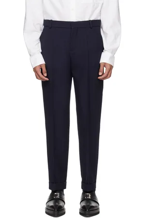 Balmain Pantalon bleu marine à revers roulés