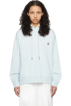 Moncler Pull à capuche bleu à logo brodé
