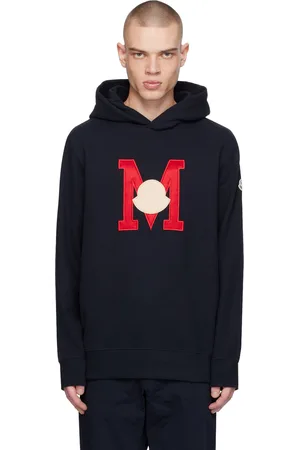 Moncler Pull à capuche bleu marine à appliqué à logo