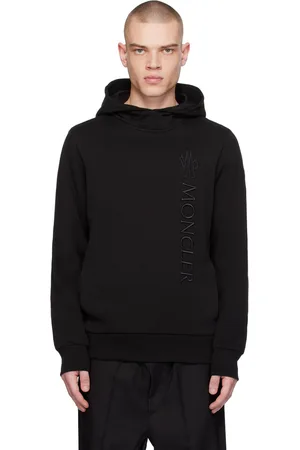 Moncler Pull à capuche noir à logo brodé