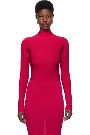 Alaïa Justaucorps rose à col montant