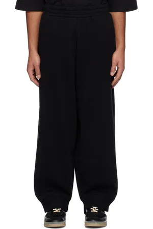 Maison Margiela Pantalon de survêtement noir à revers fendus