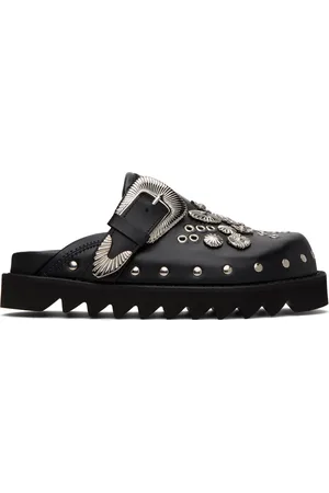 TOGA PULLA Chaussures à enfiler de style sabot noires à œillets en métal