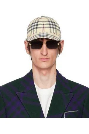 Burberry Casquette beige à carreaux