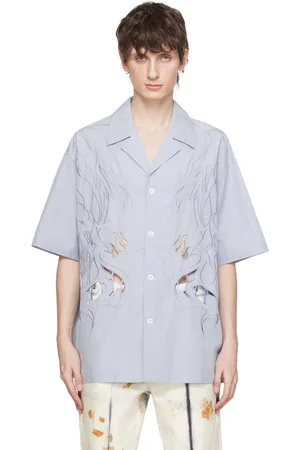 Feng Chen Wang Chemise bleue à découpes