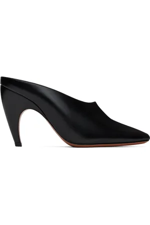 Alaïa Mules à petit talon sculptural noires