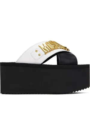 Moschino Sandales compensées noir et blanc à ferrure à logo