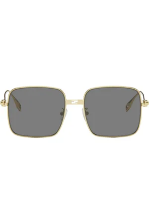 Fendi Lunettes de soleil dorées à logos Baguette
