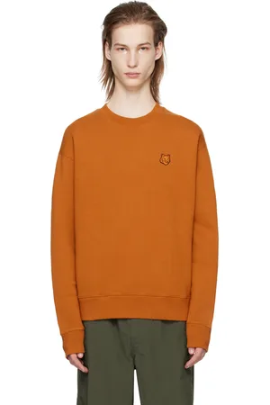 Maison Kitsuné Pull molletonné orange à logo de renard