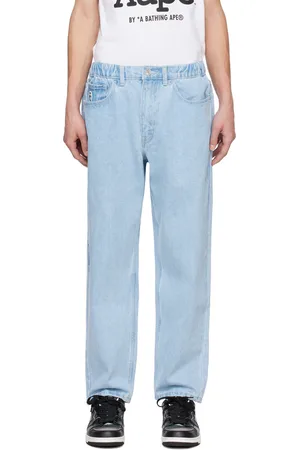 A Bathing Ape Jean bleu à écusson à logo Moonface