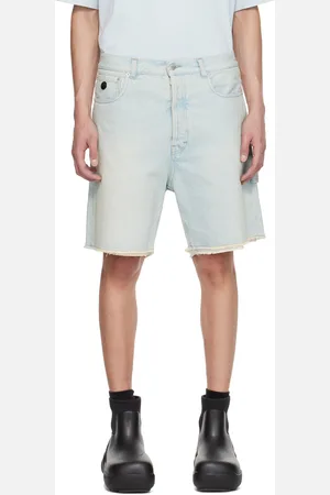 AMBUSH Short bleu en denim à bords bruts