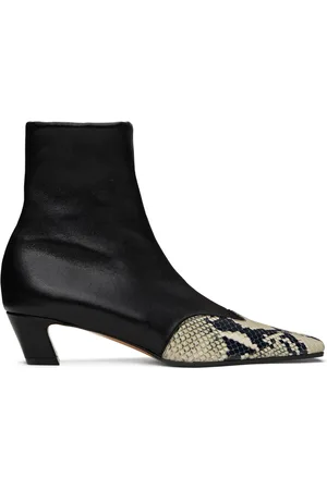 Khaite Bottines Nevada noires en cuir extensible