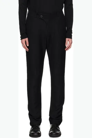 DEVOA Pantalon noir à coutures extérieures incurvées