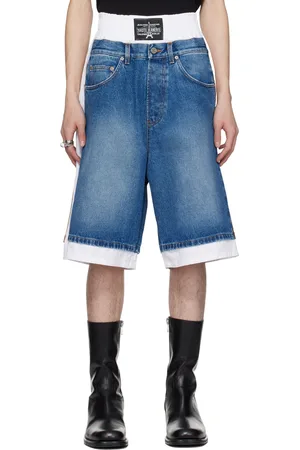 Jean Paul Gaultier Short bleu et blanc en denim à appliqués trompe l